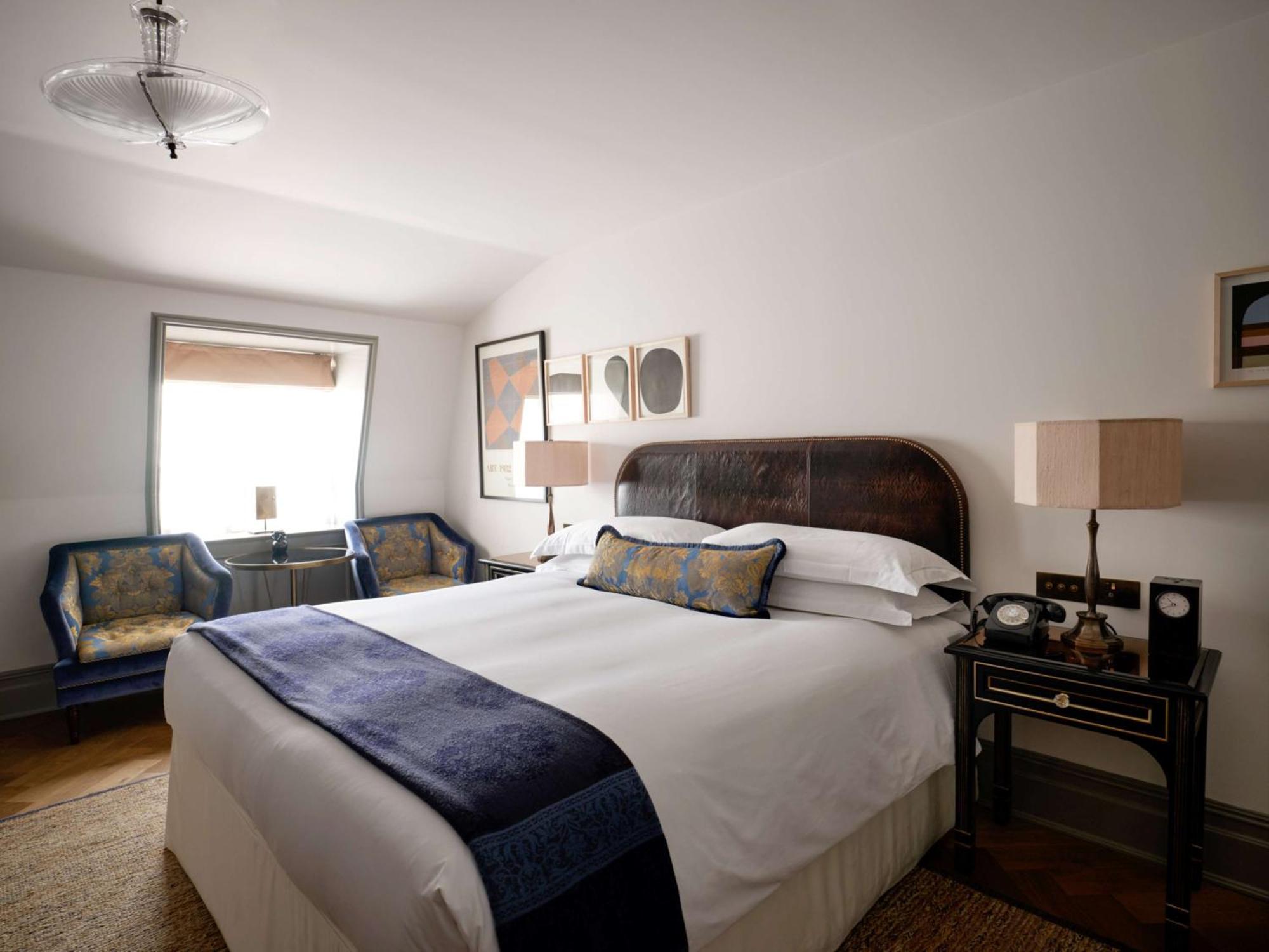 Nomad London Hotel Kültér fotó A bedroom at the hotel